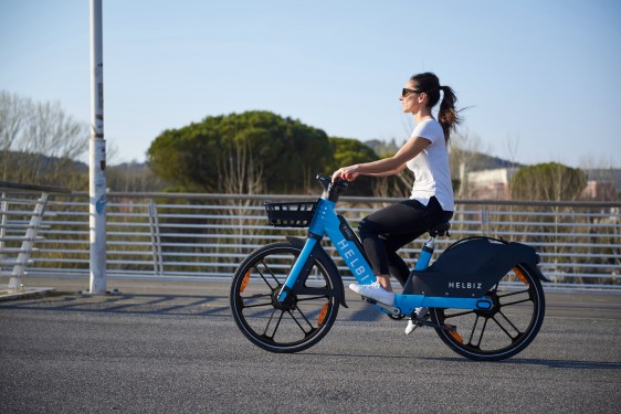 woman riding helbiz bike