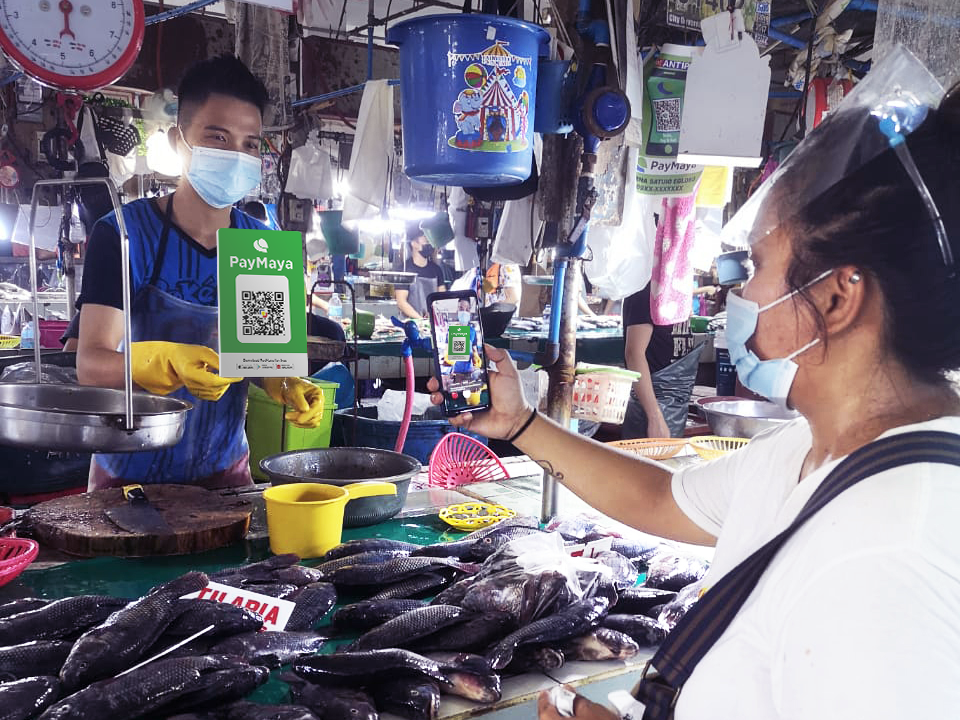 A customer using PayMaya app