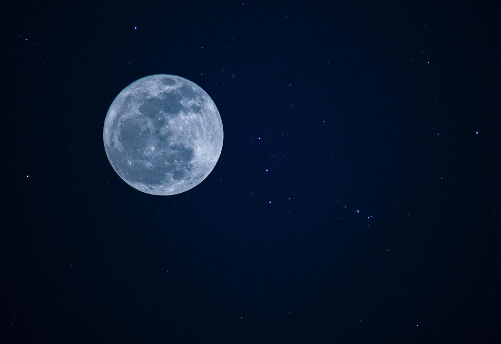 Moon and stars in the night sky