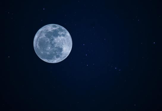 Moon and stars in the night sky
