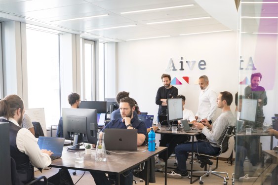 A photo of Aive's team working in their office