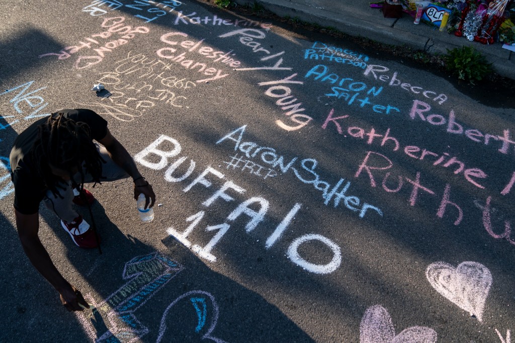 names of buffalo shooting victims written in chalk