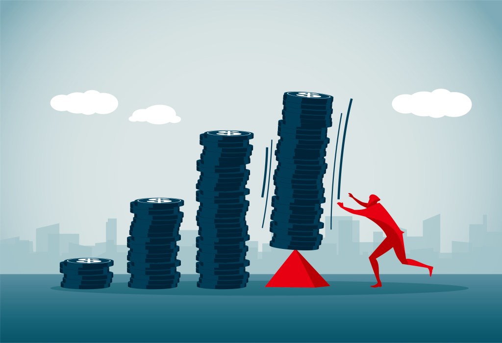 Illustration of a person trying to hold a stack of coins upright on top of a triangle.