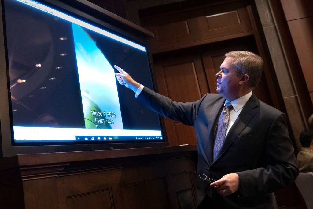 U.S. Deputy Director of Naval Intelligence Scott Bray explains a video of an unidentified aerial phenomena, as he testifies before a House Intelligence Committee subcommittee hearing at the U.S. Capitol on May 17, 2022 in Washington, DC