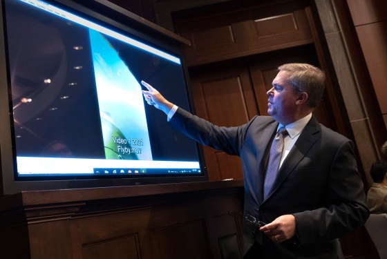 U.S. Deputy Director of Naval Intelligence Scott Bray explains a video of an unidentified aerial phenomena, as he testifies before a House Intelligence Committee subcommittee hearing at the U.S. Capitol on May 17, 2022 in Washington, DC