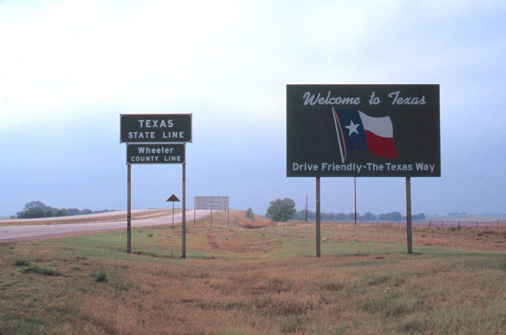 A "Welcome to Texas" sign at the Texas border.