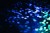 An illustration of email icons floating around in blue and green.