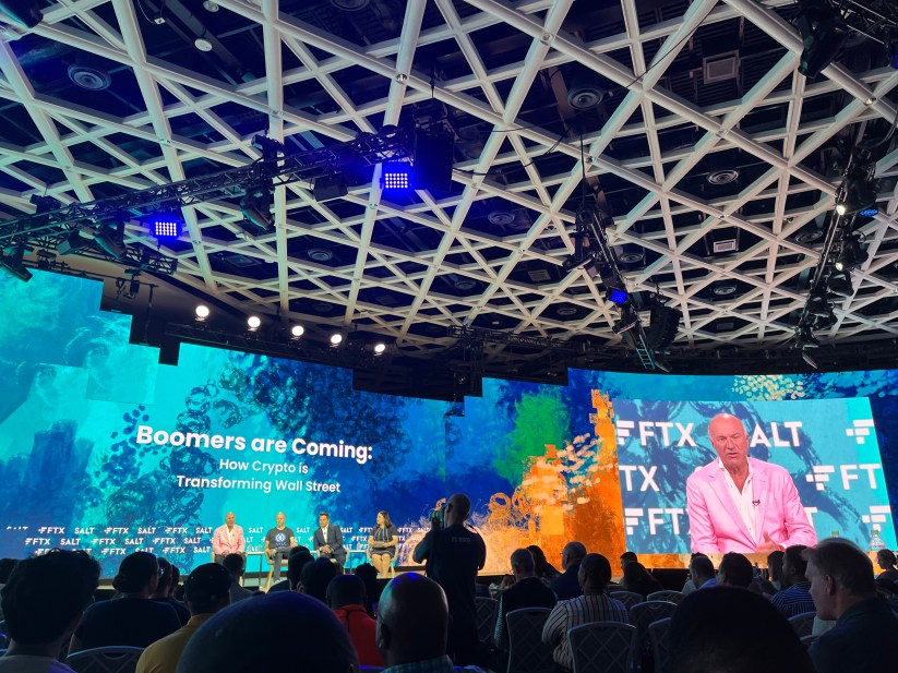 A panel titled "Boomers are coming" at Crypto Bahamas in April 2022.
