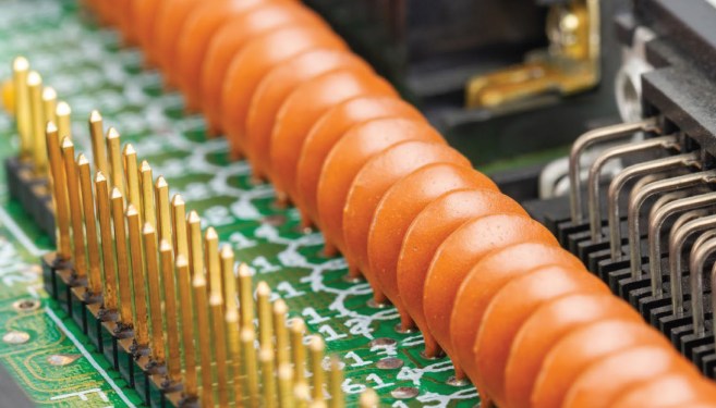 A row of ceramic disk capacitors looking all pretty