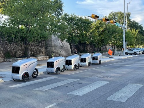 Refraction AI robots in bike lane in SoCo, Austin
