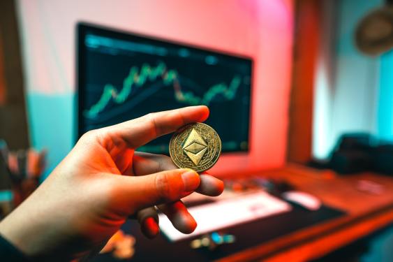 hand holding coin/token