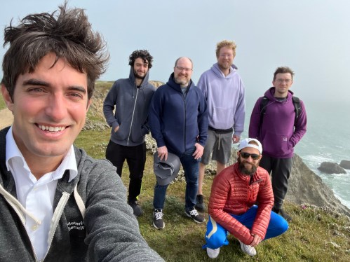 A photo of six people, Socket's team, with one person taking the photo from a selfie position.