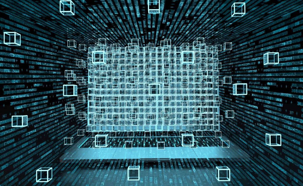 A laptop with illustrated blocks flying out of the screen.