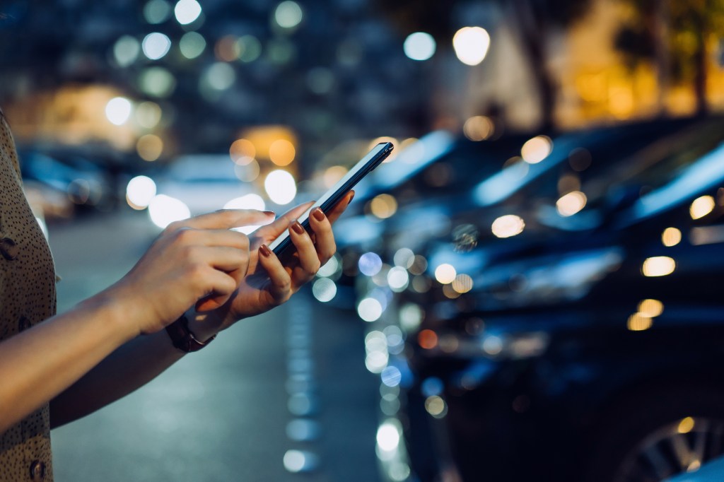 Woman using smartphone app.