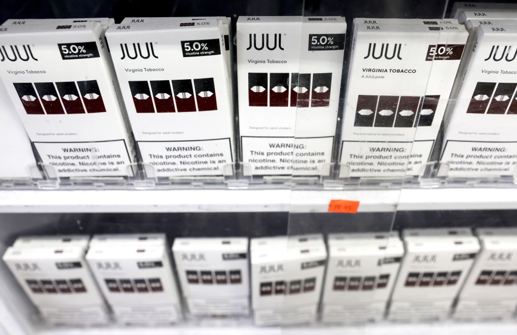 Packages of Juul e-cigarettes are displayed for sale in the Brazil Outlet shop on June 22, 2022 in Los Angeles, California
