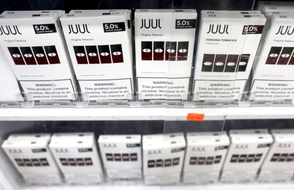 Packages of Juul e-cigarettes are displayed for sale in the Brazil Outlet shop on June 22, 2022 in Los Angeles, California