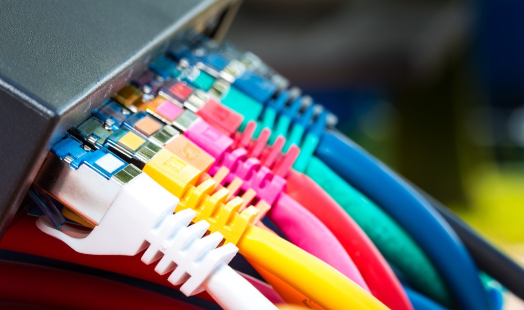 Colorful network cables connected to a switch