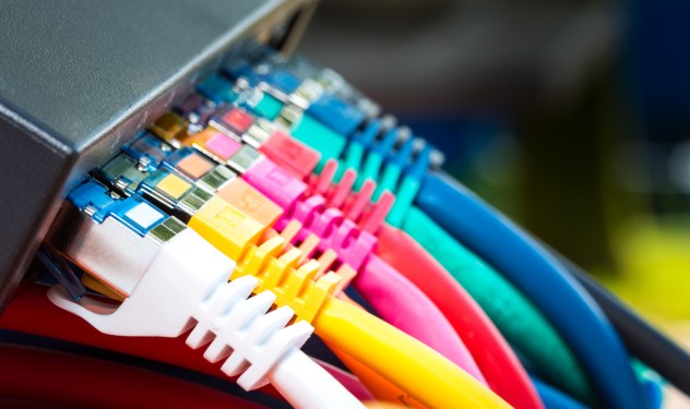 Colorful network cables connected to a switch