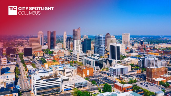 Aerial view of Downtown Columbus Ohio. Text overlay reads "TC City Spotlight Columbus"