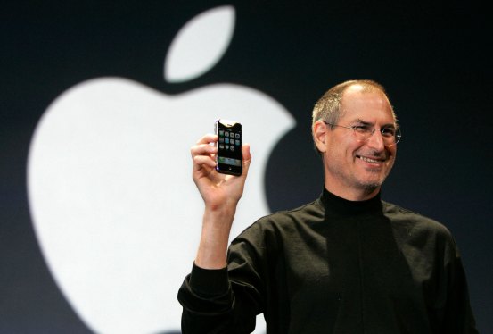 Apple CEO Steve Jobs holds up the new iPhone during his keynote address at MacWorld Conference & Expo in San Francisco, Tuesday, Jan. 9, 2007.