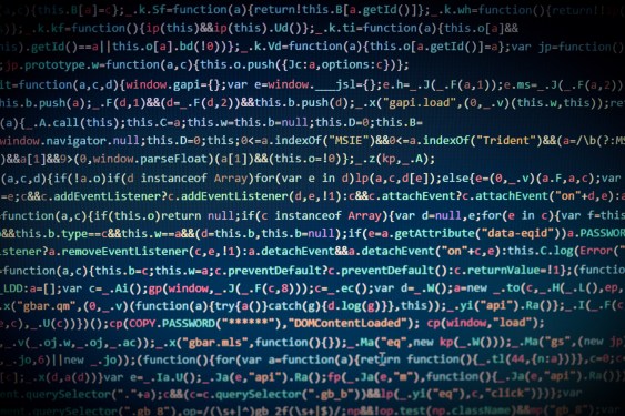 Computer code on a darkened blue background