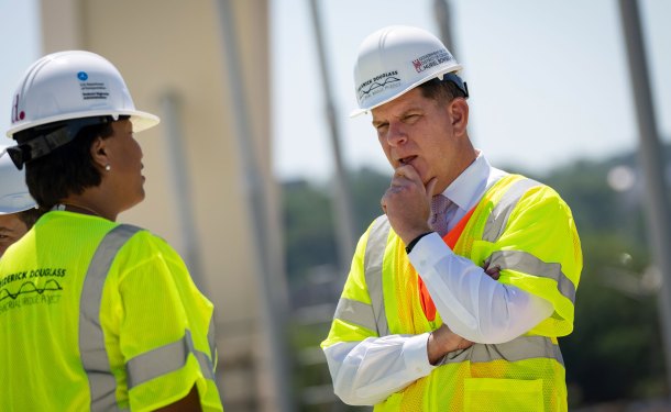 Washington, DC Mayor Muriel Bowser talks with Secretary of Labor Marty Walsh as they tour the construction site atop the new Frederick Douglass Memorial Bridge on May 19, 2021 in Washington, DC