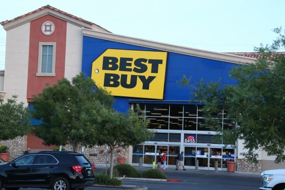 A Best Buy logo is seen displayed on the exterior of their