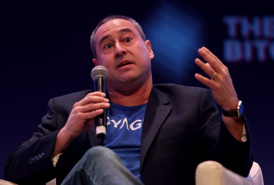 seated man with microphone
