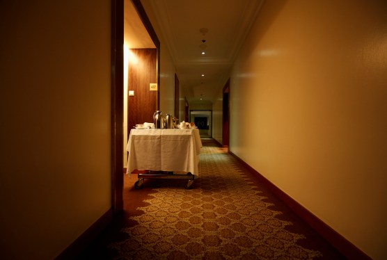 Room service trolley in hotel hallway