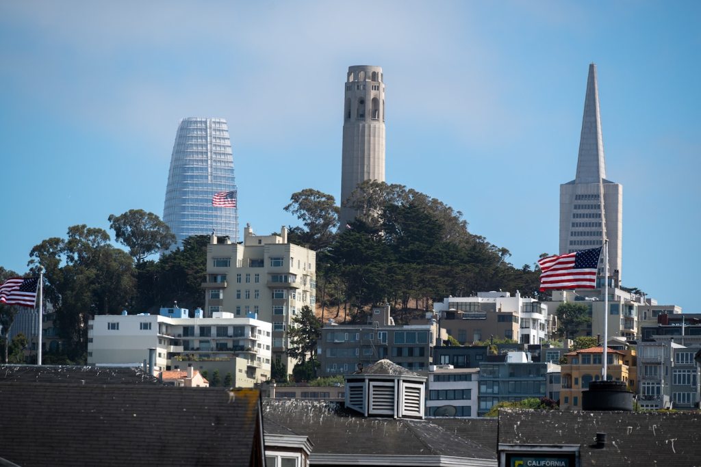 A photo of Telegraph Hill in San Francisco with Salesforce Tower, Coit Tower and the Transamerica Pyramid.