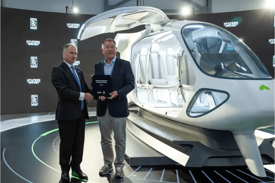 two men next to eVTOL