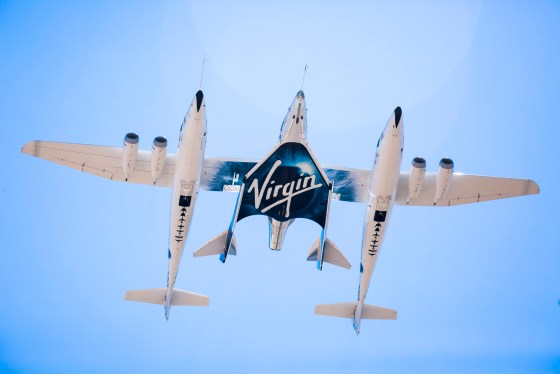 view looking up as Virgin Spaceship Unity and Virgin Mothership Eve take to the skies on it's first captive carry flight