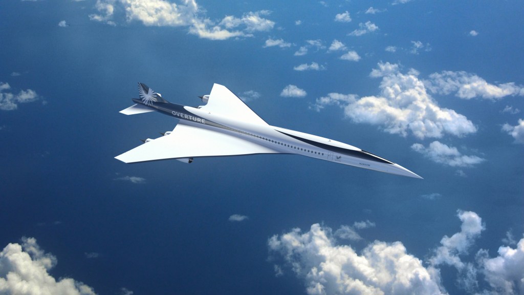 Boom Supersonic's Overture jet flying over sea and clouds