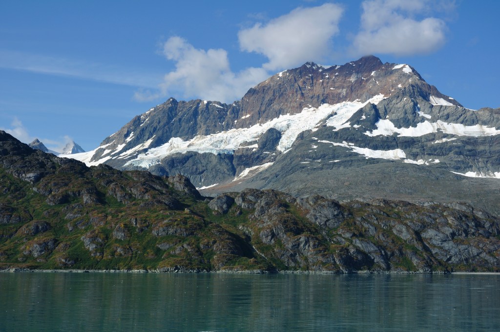 mountains with lake in foreground
