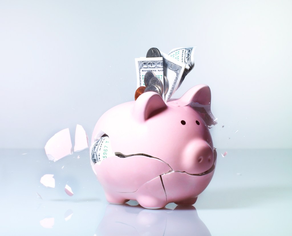 Piggy bank exploding, close-up