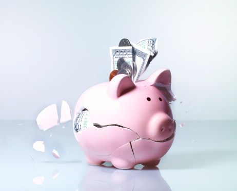 Piggy bank exploding, close-up