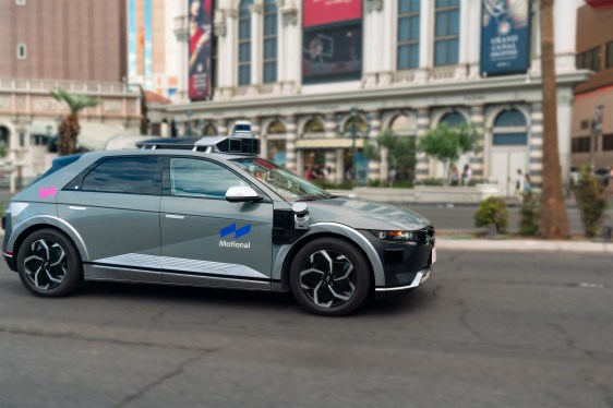 A grey Hyundai IONIQ 5, fitted with lidar, camera and other sensors, on street in Las Vegas