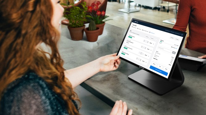 woman at Point of Sale screen