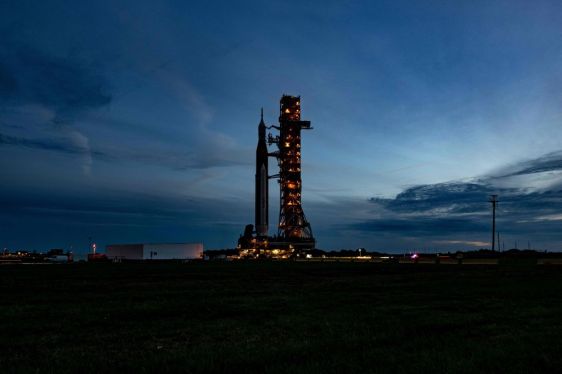 rocket on launch pad at dusk