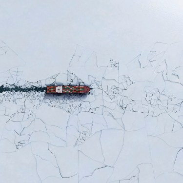 Container ship breaking ice; supply chain risk