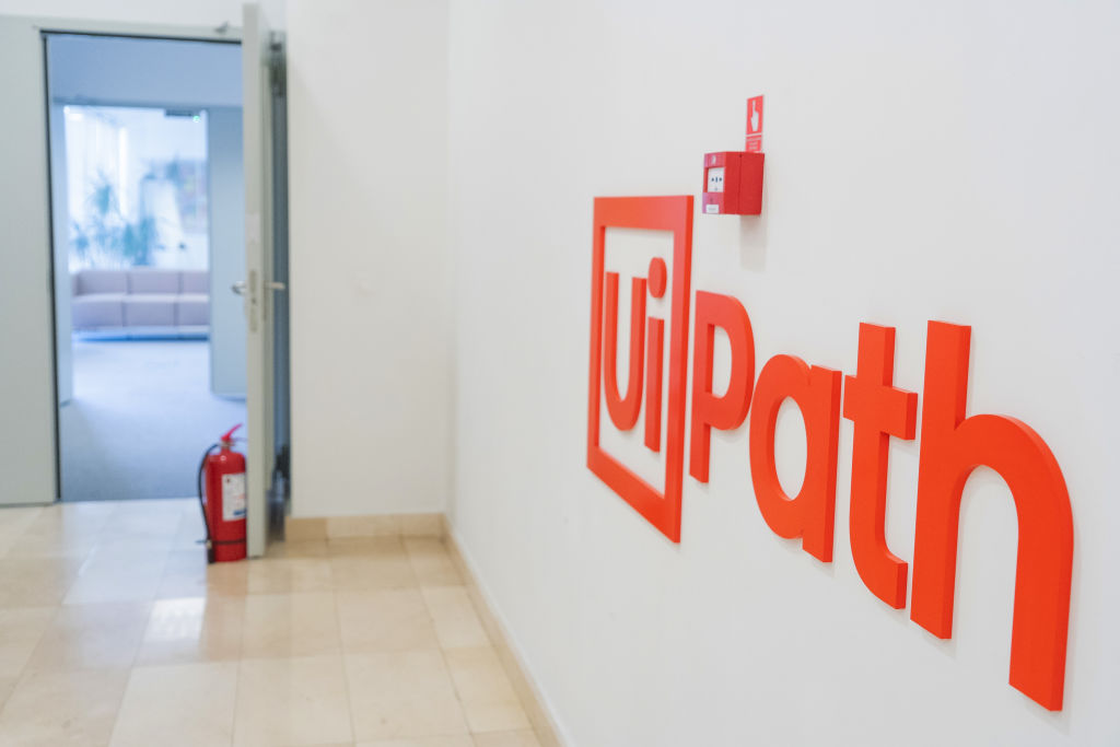 UiPath offices with logo on the wall.