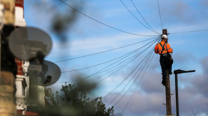 maintenance work on a telegraph pole