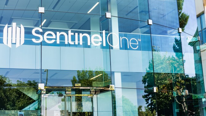 A glass building emblazoned with SentinelOne's logo.