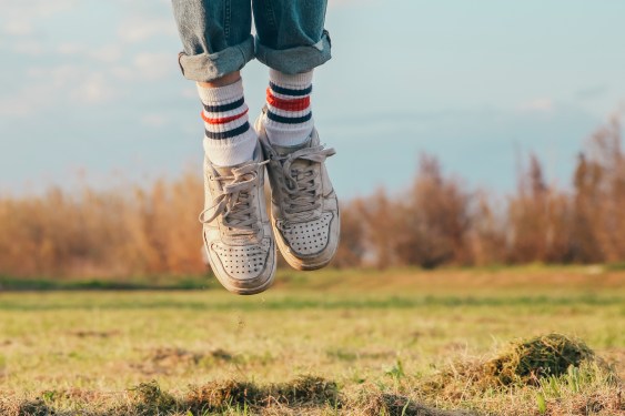 frame of feet jumping; asset light models