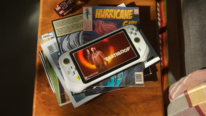 handheld gaming console on coffee table