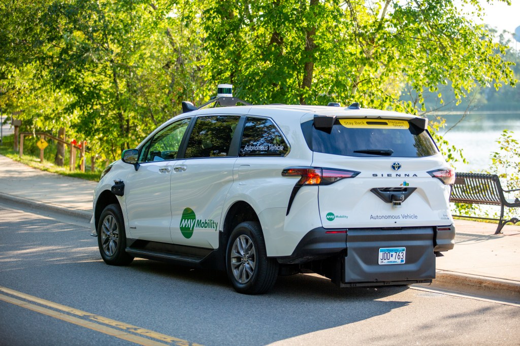White Toyota Sienna with May Mobility logo