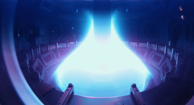 Glowing plasma inside the Mega Ampere Spherical Tokamak.