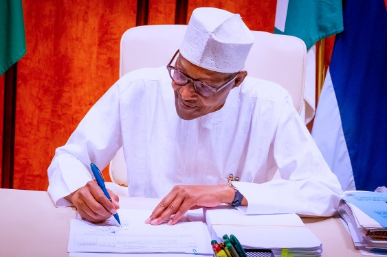 President of Nigeria Muhammadu Buhari signing legislation