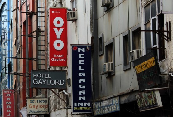 OYO sign on a hotel building in New Delhi, India