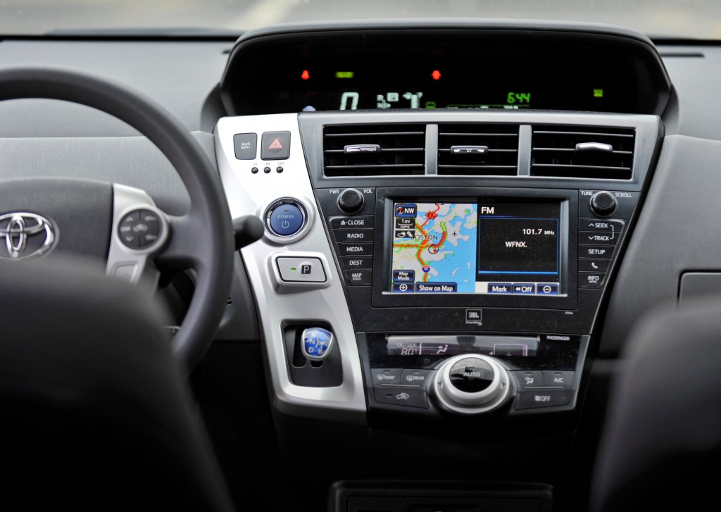 A photo of inside a Toyota vehicle with the dashboard infotainment system on display.